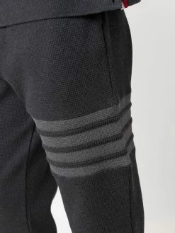 Thom Browne 4 Bar tapered track pants performance trousers of men 11 Thom Browne 4-Bar tapered track pants