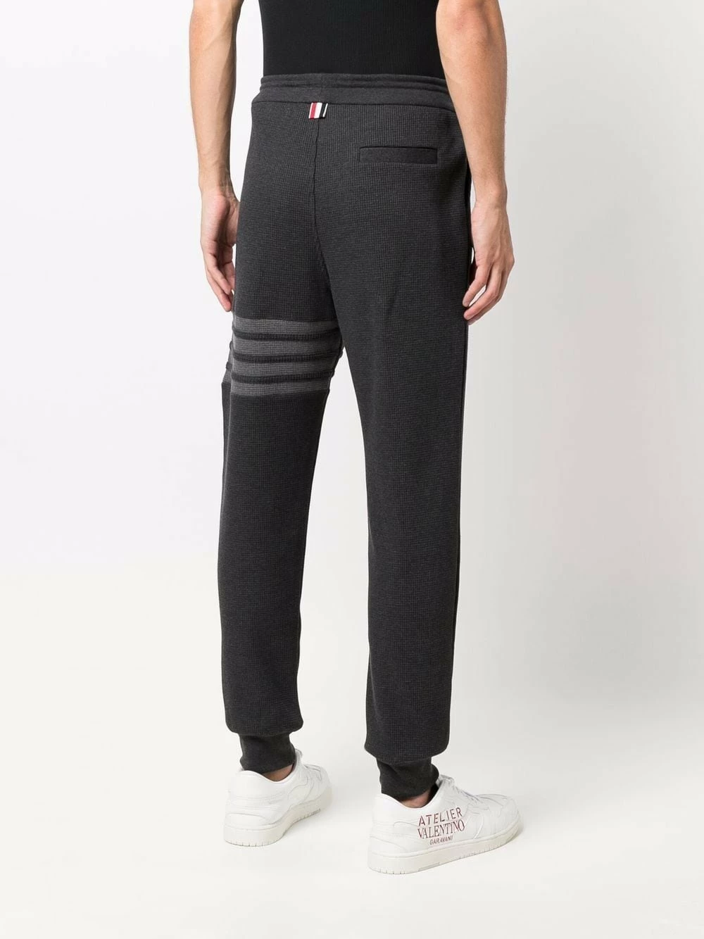 Thom Browne 4 Bar tapered track pants performance trousers of men 4 Thom Browne 4-Bar tapered track pants