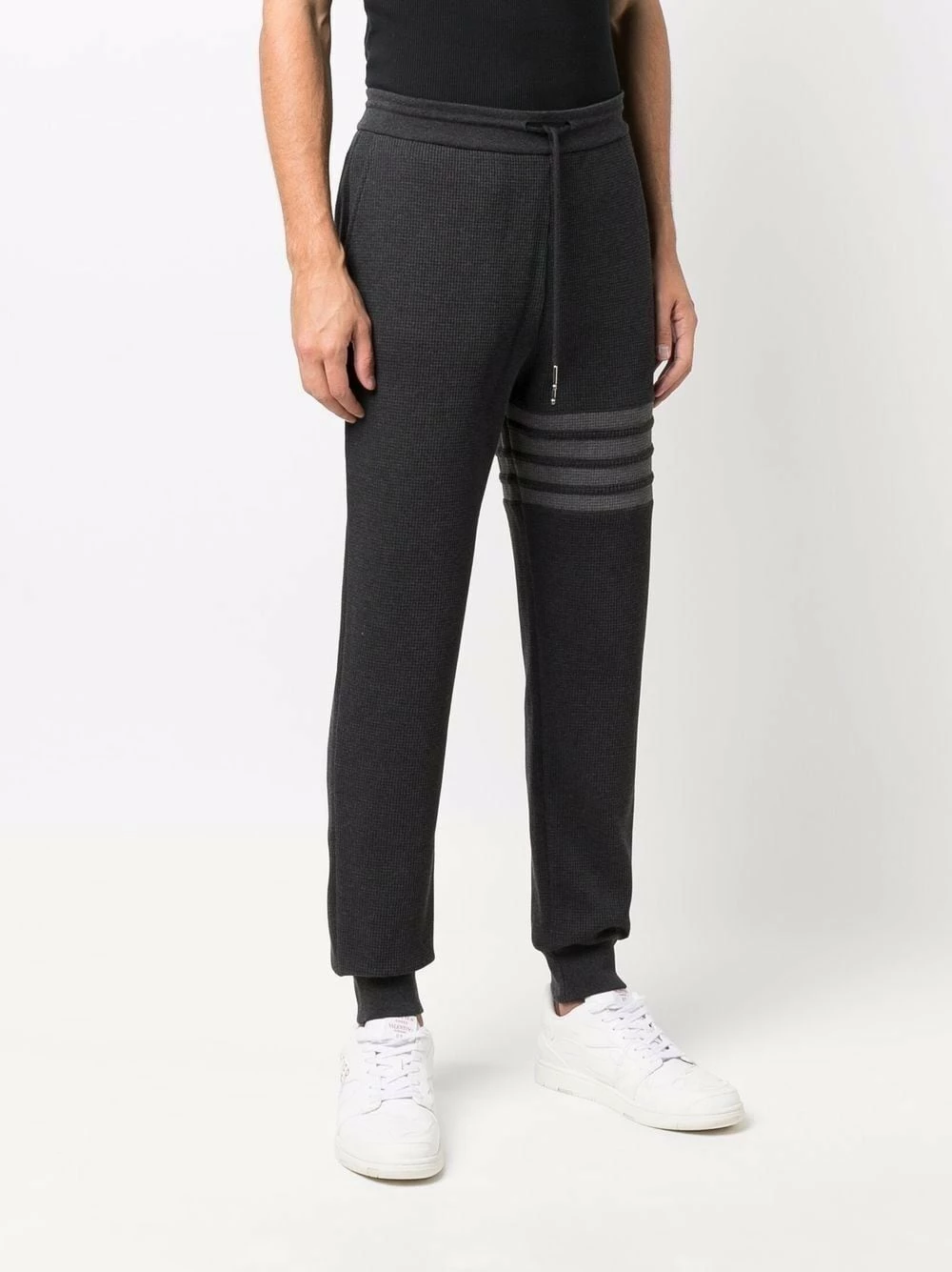 Thom Browne 4 Bar tapered track pants performance trousers of men 3 Thom Browne 4-Bar tapered track pants