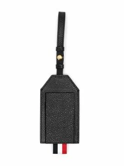 Thom Browne logo lettering leather travel hangtag